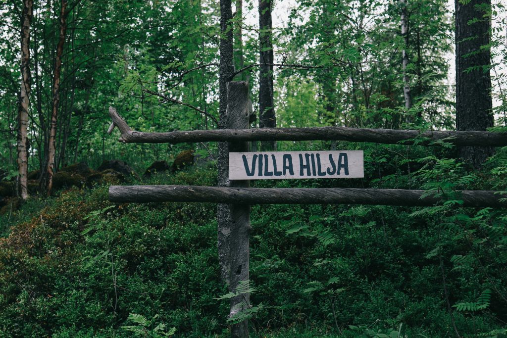 Our cottage, via Mokkiavain cottages. A sign reading 'Villa Hilsa' found next to the Finnish lakelands.
